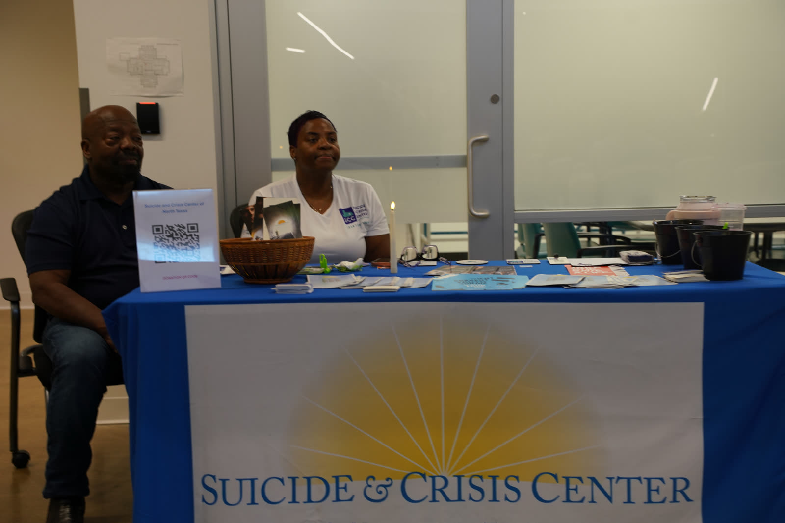 The Suicide and Crisis Center information table with brochures